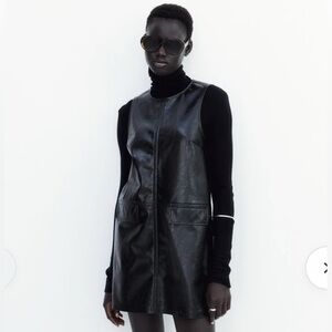 Elegant Black faux Leather two pocket Midi Dress NWT